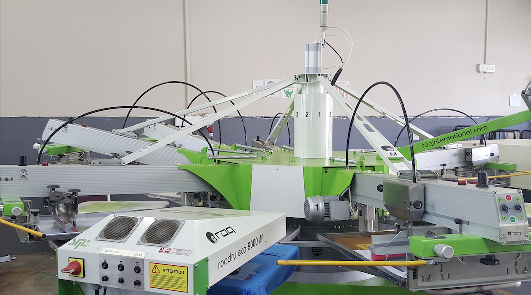 Automatic carousel screen-printing press in the production room