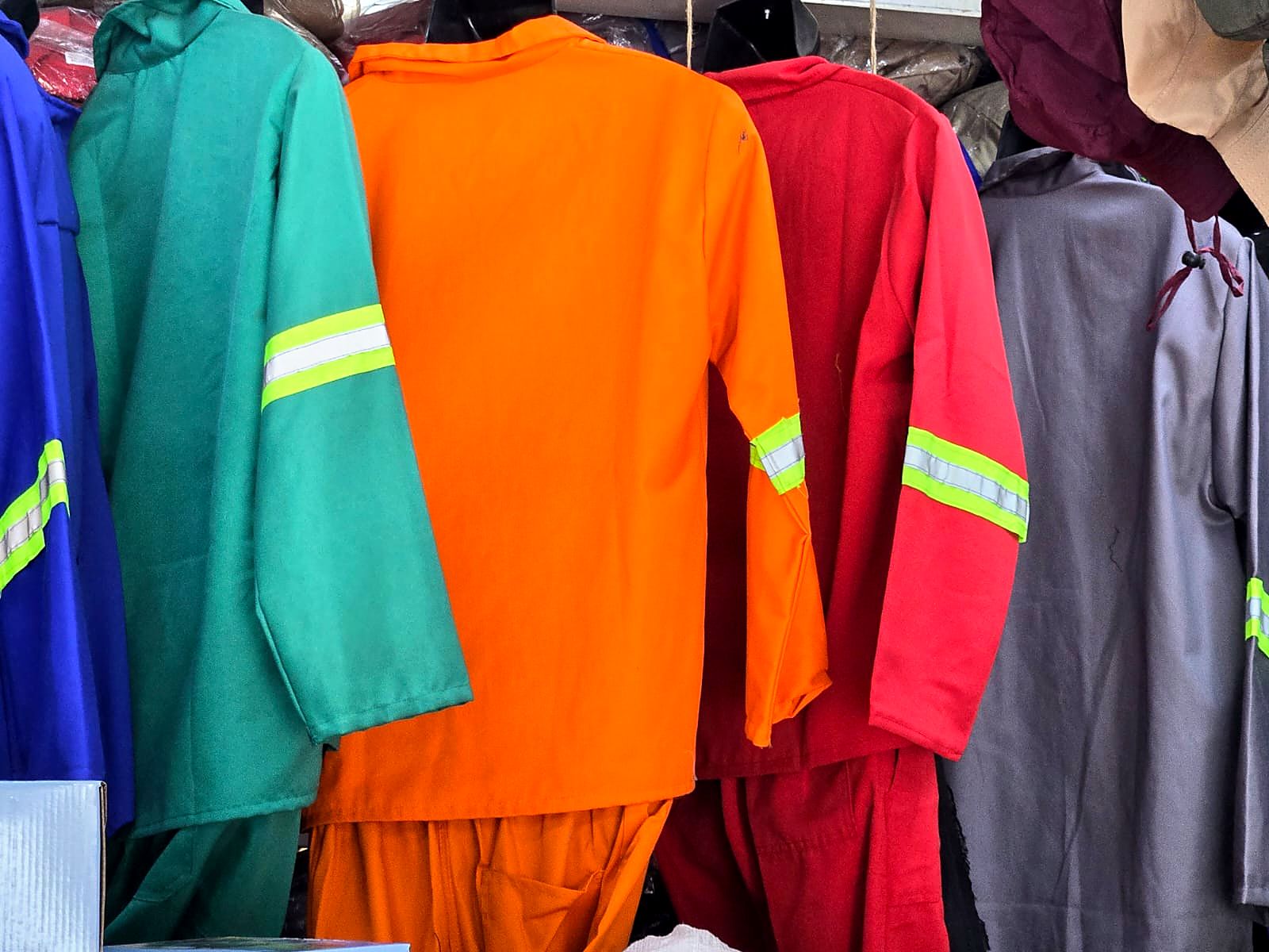 Conti suits with reflective tape on a rail